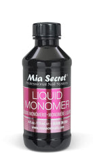Mia Secret front label on 4 oz monomer bottle showing brand and size, clear benefit of product ID