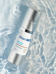 MiamiMD applying serum to back of hand to show targeted spot treatment benefit