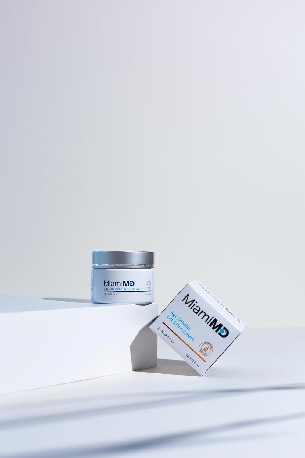MiamiMD size comparison in hand to show 50 ml scale and travel-friendly convenience