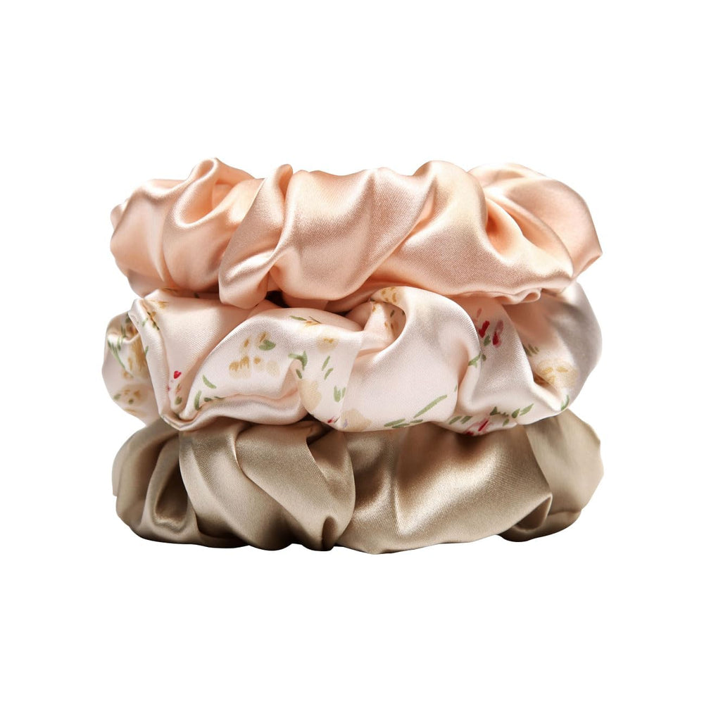 Michooyel scrunchies front view showing three silk hair ties and packaging benefit gentle hold