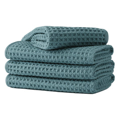MICROFI front view of four green towels showing packaging benefit compact set