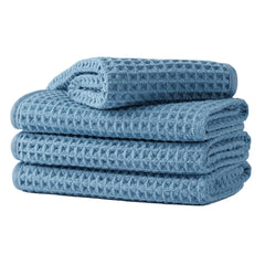 MICROFI front view of blue four-piece towel set showing compact packaging and color
