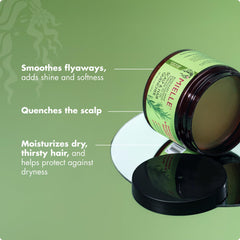 Mielle Organics being warmed on hands to demonstrate spreadability and controlled use.
