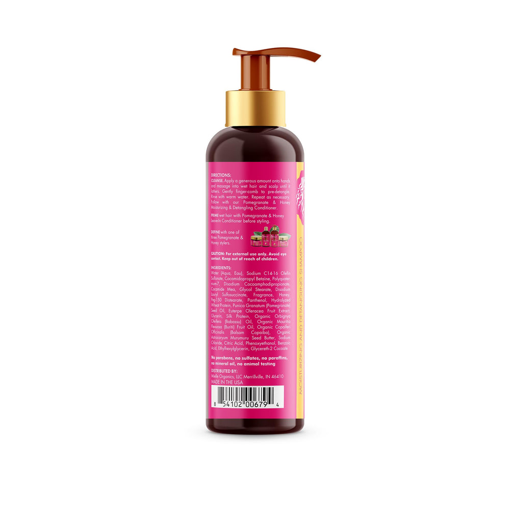 Mielle Organics being applied to Type 4 curls for gentler detangling
