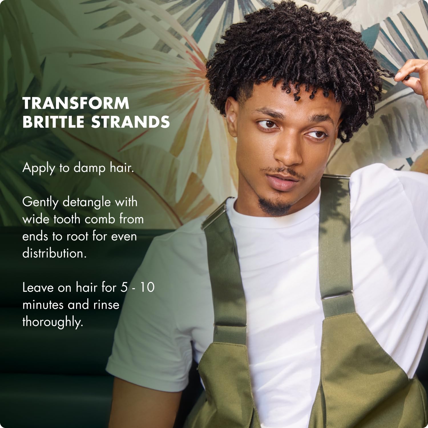 Mielle Organics label close-up featuring biotin and botanical ingredients for strength