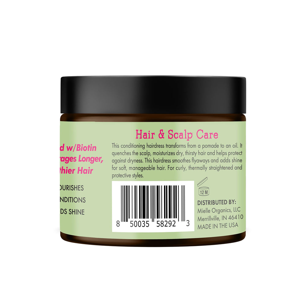 Mielle Organics jar on bathroom vanity lifestyle scene suggesting everyday grooming routine.