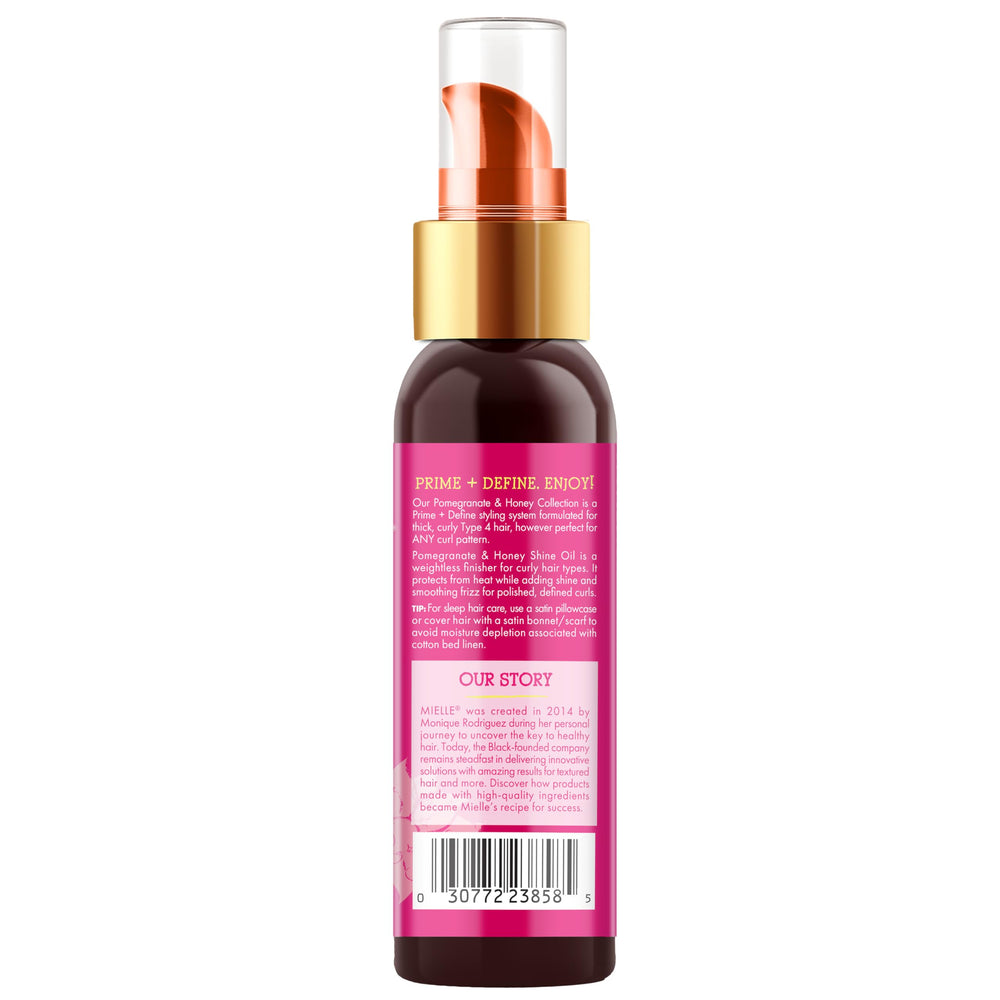 Person with Type 4 hair outdoors using Mielle Organics, enhances natural radiance