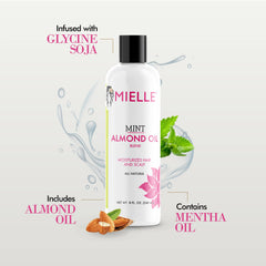 Mielle Organics applying oil to scalp to soothe and hydrate