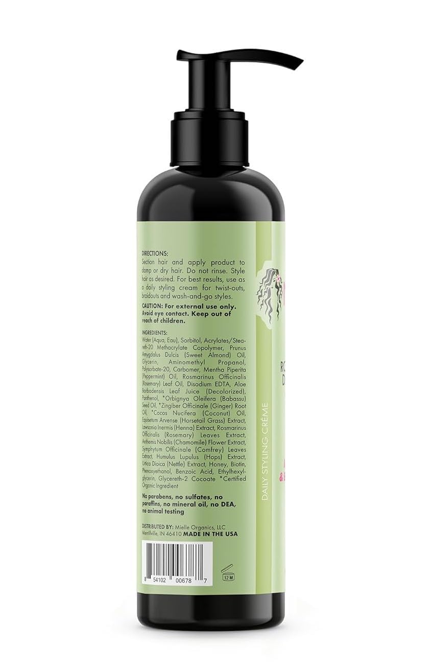 Mielle Organics ingredients label close-up highlighting rosemary oil and biotin benefit