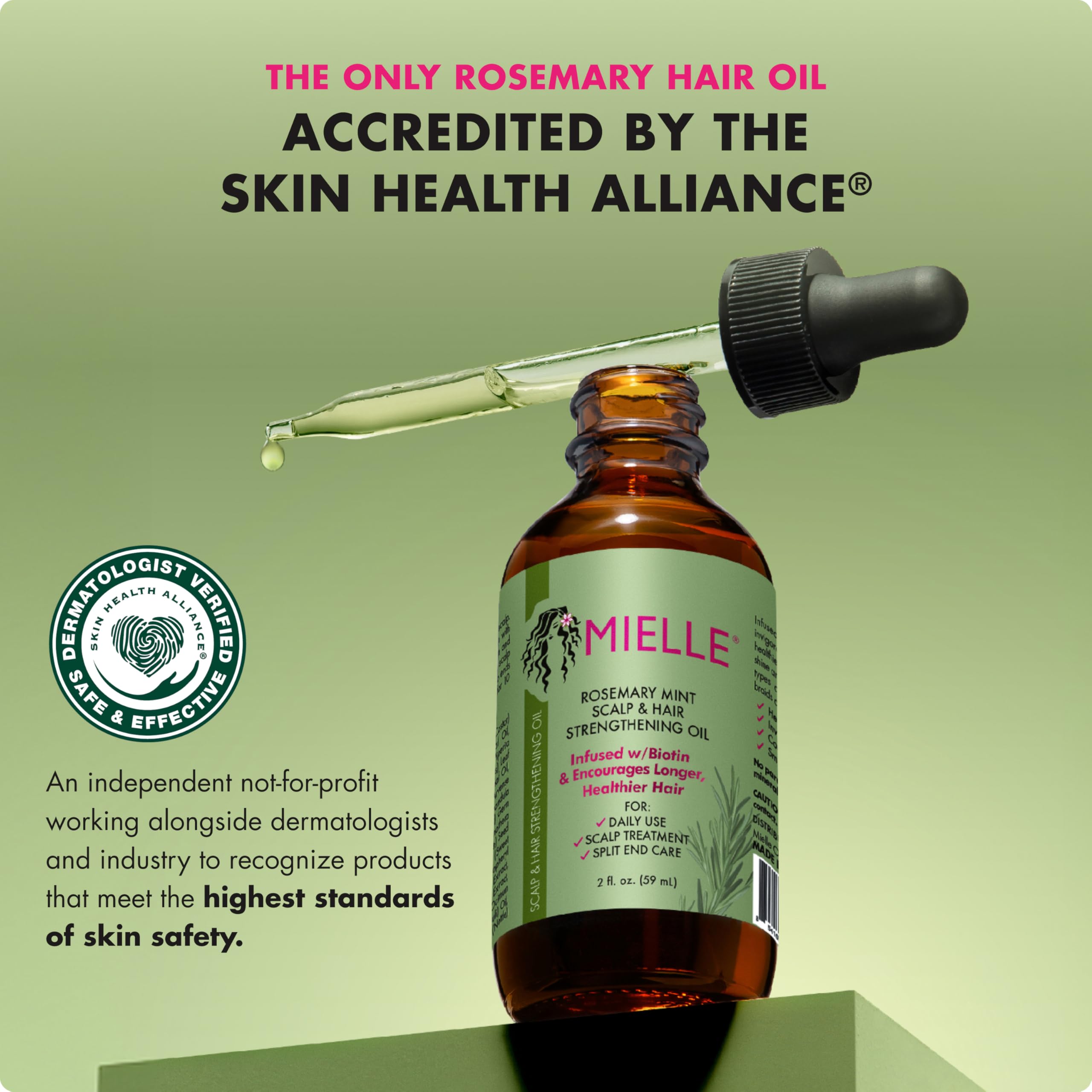 Mielle Organics oil texture on palm demonstrating smooth, non-greasy hydration