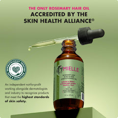 Mielle Organics oil texture on palm demonstrating smooth, non-greasy hydration