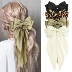 MIKONIKO front view of four bows showing colors and long tails, versatile styling benefit