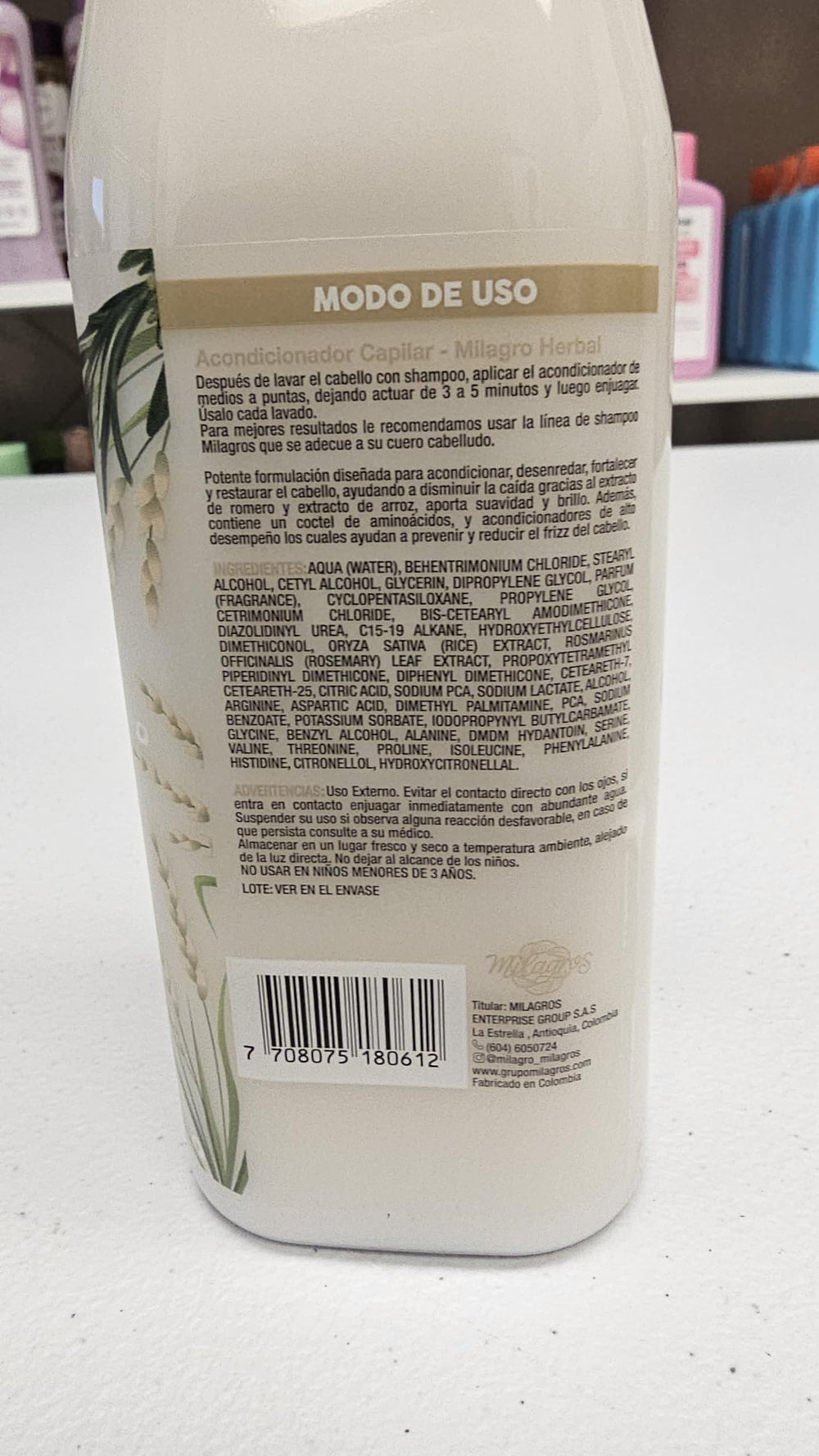 Milagros bottle held in hand for scale, clarifies 450 ml family-size convenience