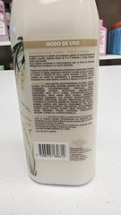 Milagros bottle held in hand for scale, clarifies 450 ml family-size convenience