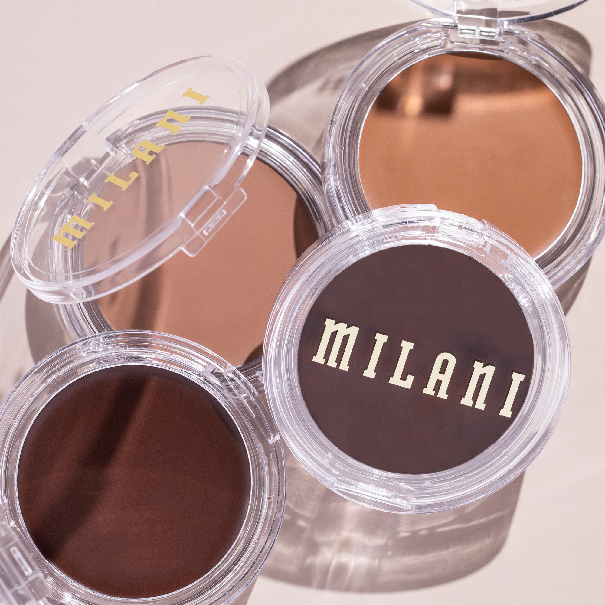 Milani open compact with shade 130 Spicy Season showing true color payoff