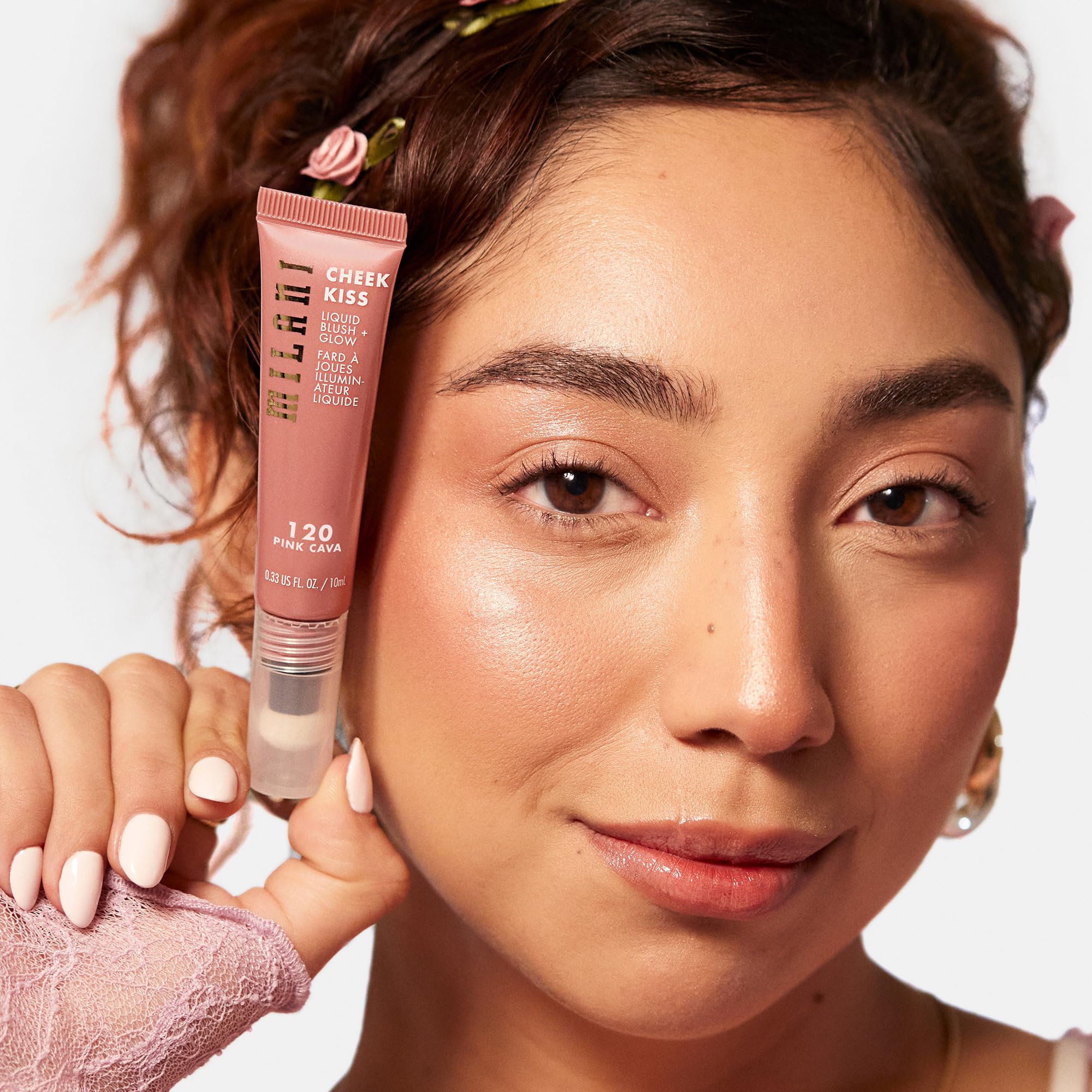 Milani applied on cheek displaying dewy, radiant finish