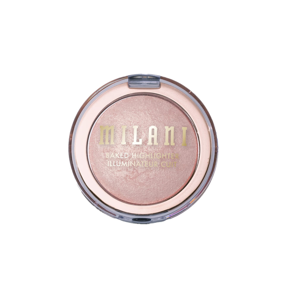 Milani Dolce Perla next to a coin for scale showing compact size portability