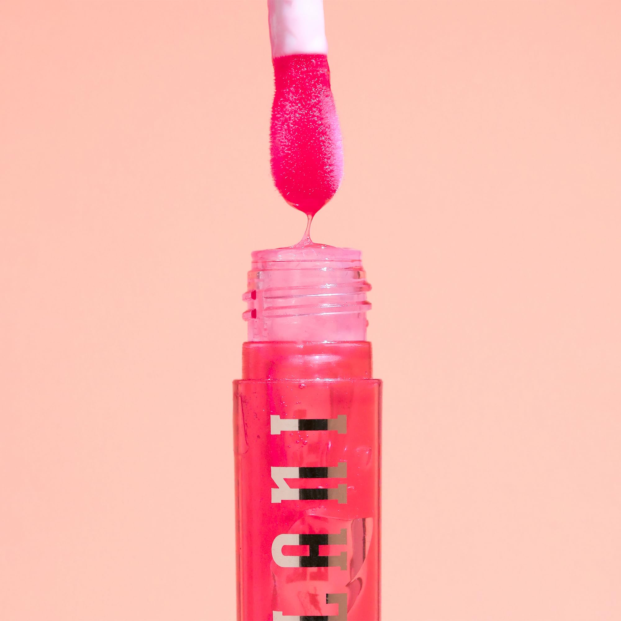 Milani size comparison next to a phone illustrating travel-friendly convenience benefit