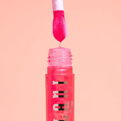 Milani size comparison next to a phone illustrating travel-friendly convenience benefit