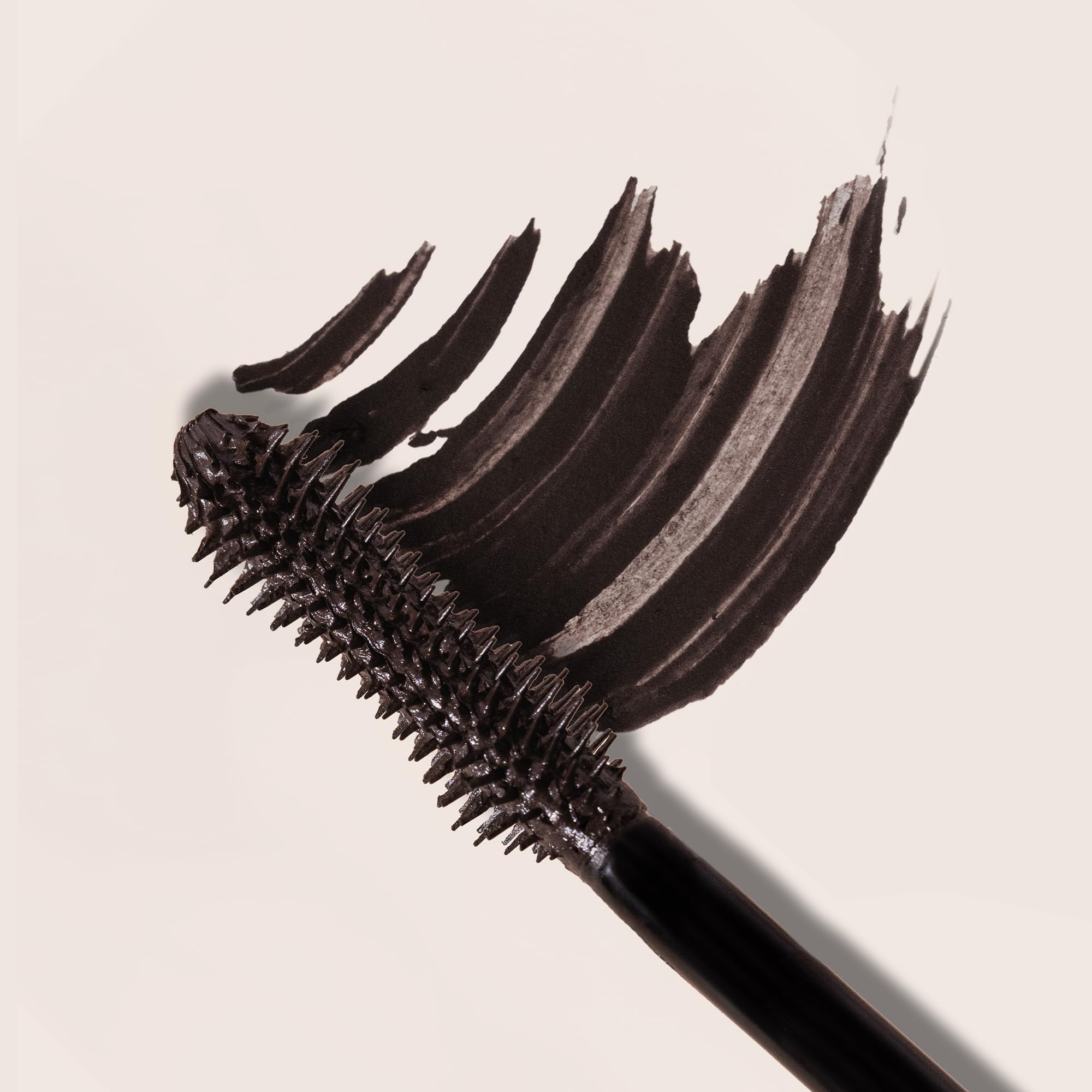 Milani before and after lashes revealing visible volume and length