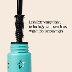 Milani mascara brown swatch on skin illustrating true color payoff