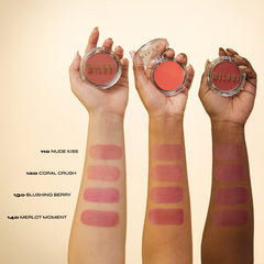 Milani applying blush with finger showing seamless skin-like application