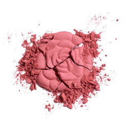 Milani applied on model outdoors, giving natural matte cheek color