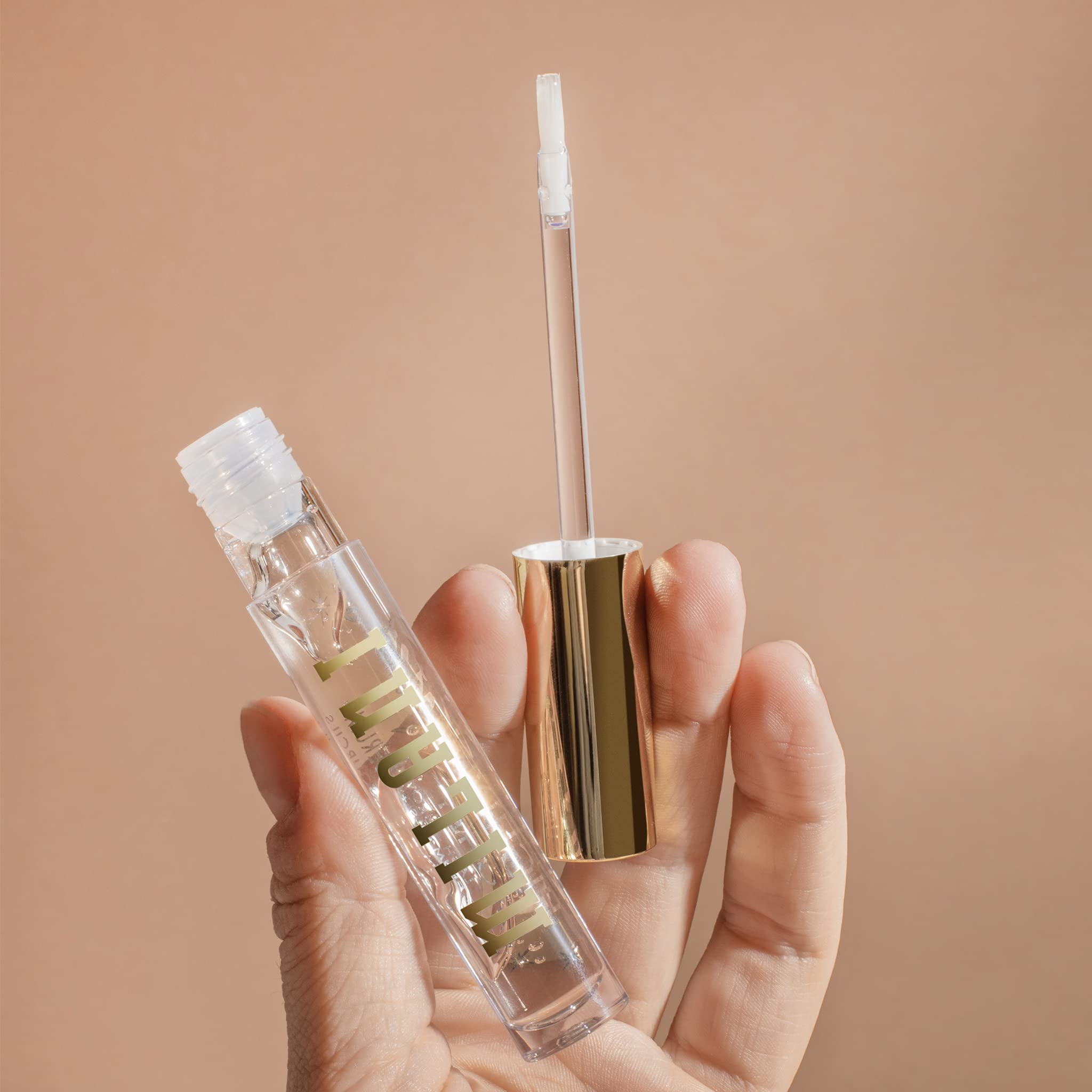 Milani clear serum droplet texture close-up demonstrating lightweight formula