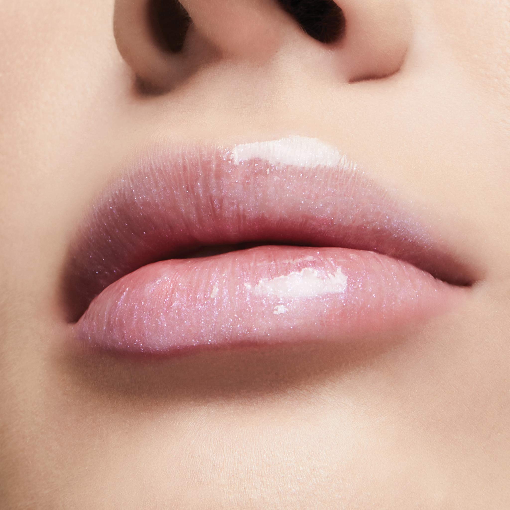 Milani shade swatch on arm showing Sparkling Pink radiance and buildable color benefit