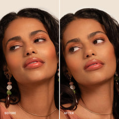 Milani misting over full face makeup to demonstrate long-lasting hold and refresh