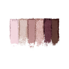 Milani application on eyelid focusing on shimmer placement for effortless evening looks