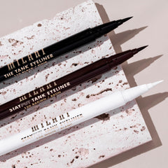 Milani white 130 swatches on skin showing opaque, buildable coverage