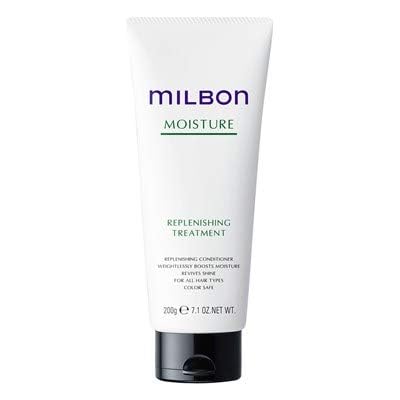 Milbon conditioner applied to wet hair demonstrating smooth, hydrated strands