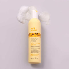 milk_shake shampoo lather close-up demonstrating gentle foam and cleansing action