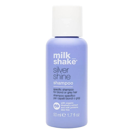 milk_shake front packaging bottle showing purple shampoo and travel size benefit