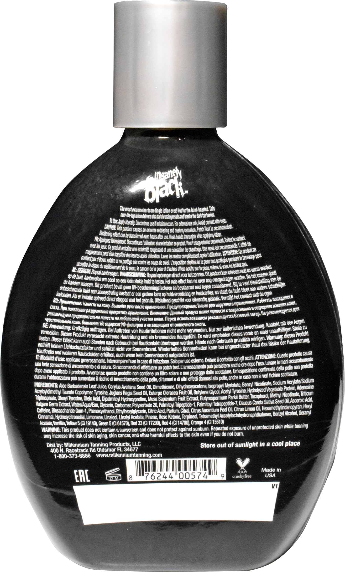 Millennium Tanning bottle next to a ruler showing compact 13.5oz size