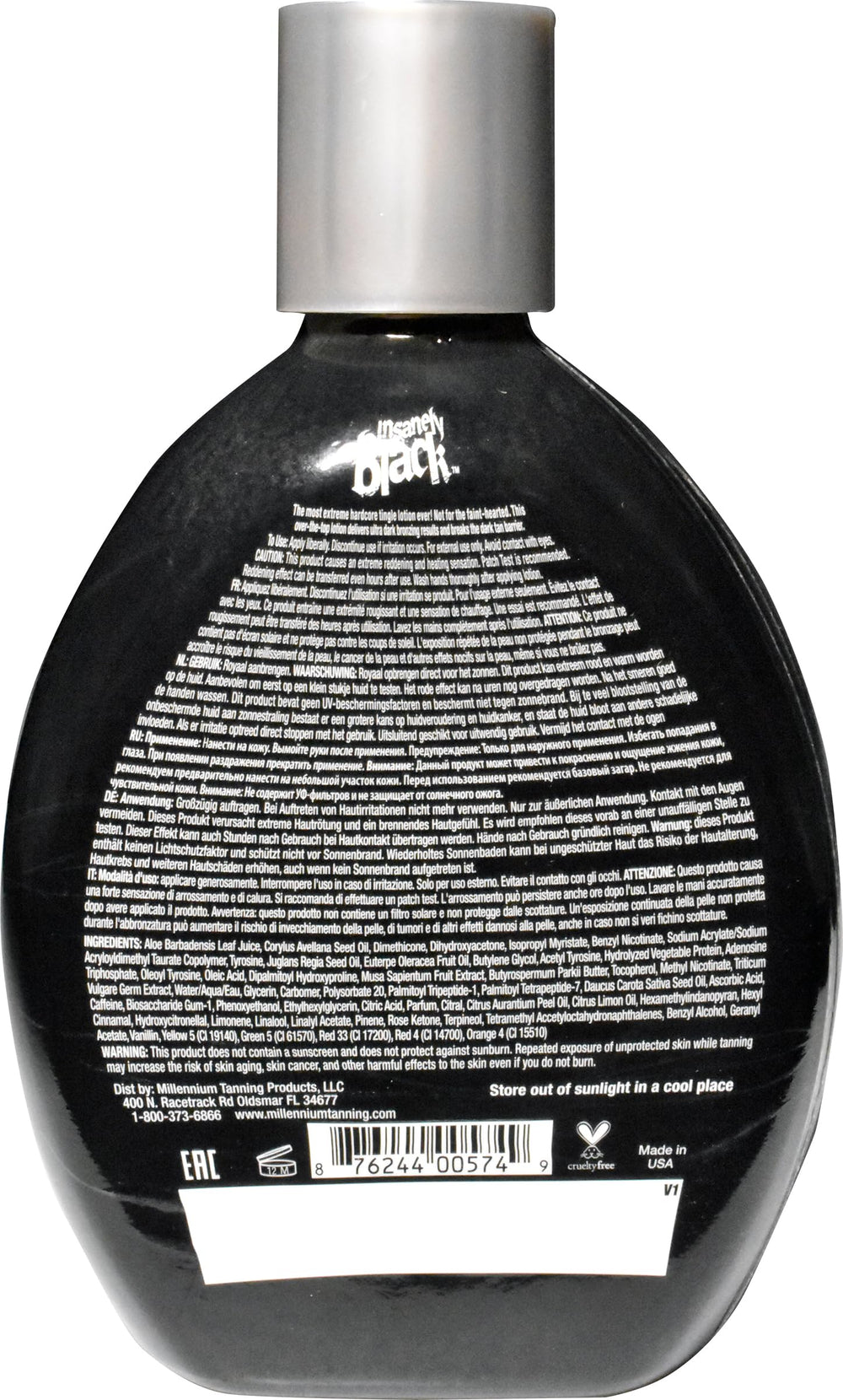 Millennium Tanning bottle next to a ruler showing compact 13.5oz size