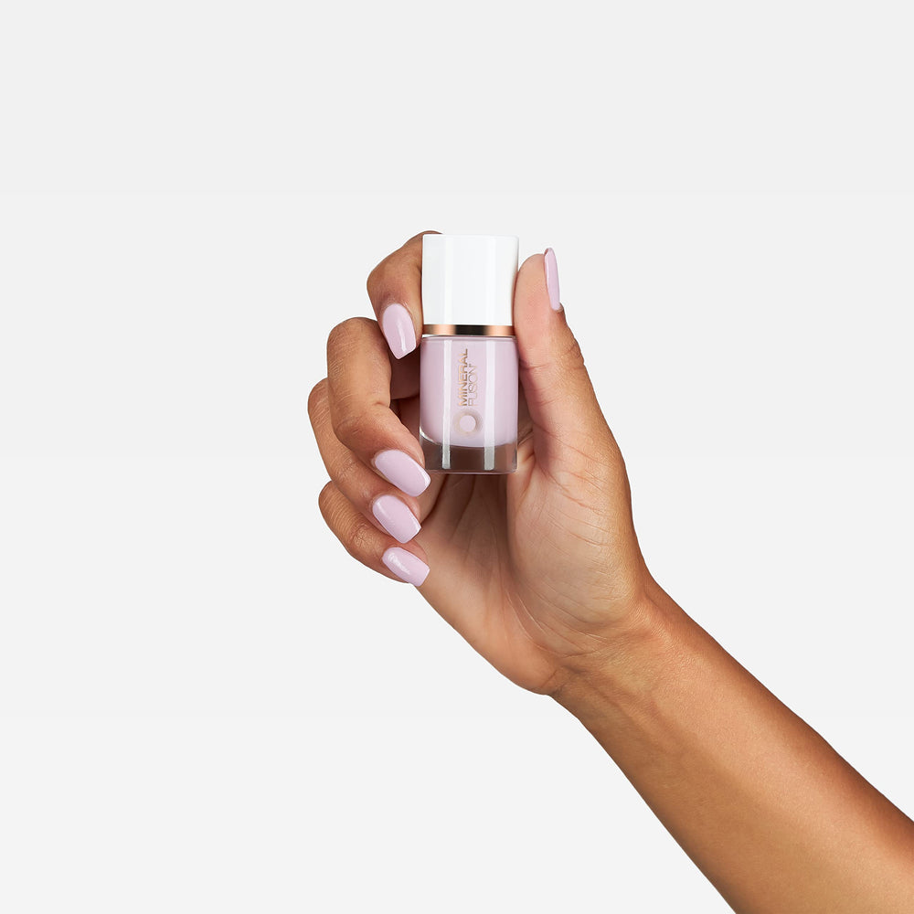 Mineral Fusion nail polish applied on nails showing glossy finish benefit