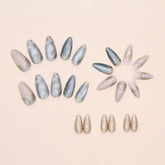 MINGCHUN hand with press-on nails next to a coin for scale to show actual short almond length