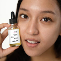 Minimalist bottle staged on bathroom shelf conveying daily routine ease and calming ritual