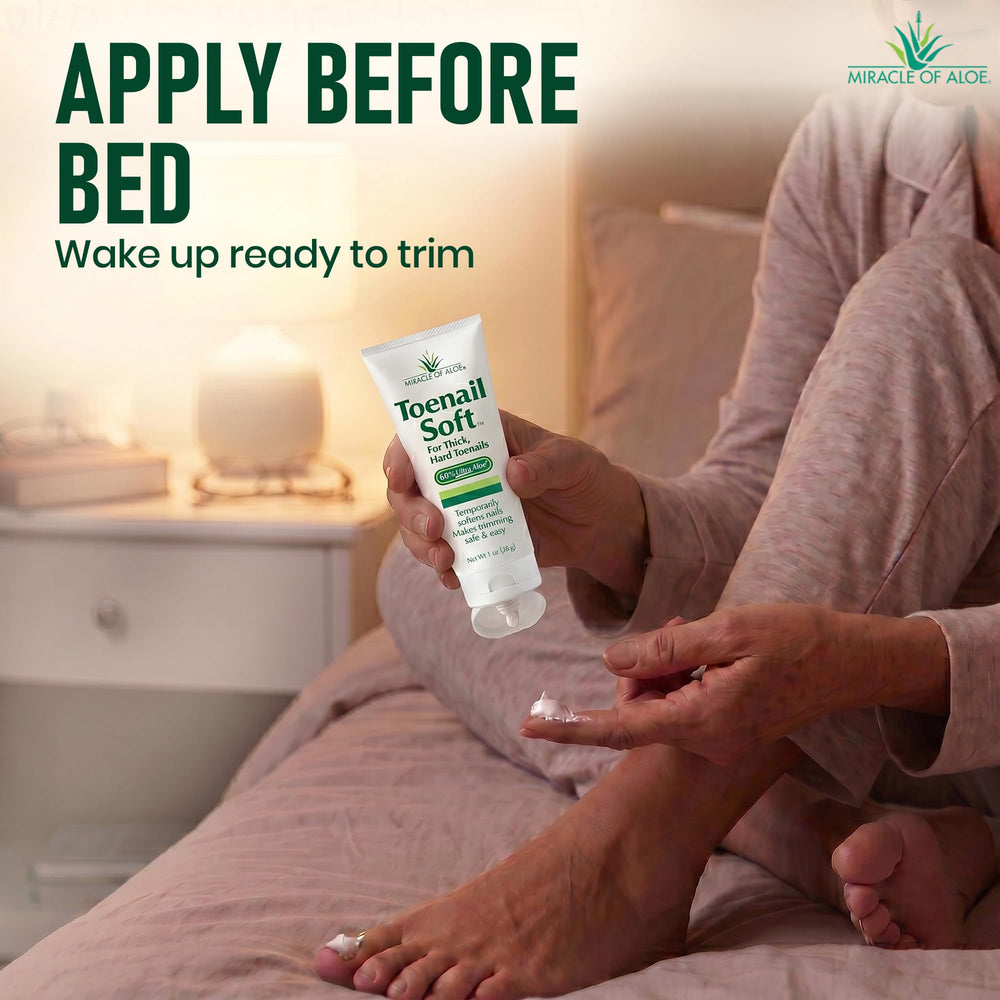 miracle of aloe tube held in hand showing 1 ounce scale and travel-friendly size
