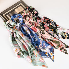 Mirlern front view of four Lily scrunchies showing patterns and colors, stylish gift-ready