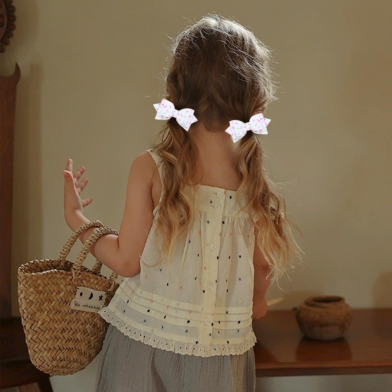 Miroksh bow worn by child in party setting adding sparkle and celebratory style