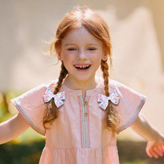 miroksh bow clipped on toddler pigtail for playful party-ready styling