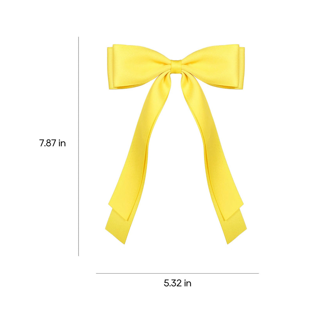Miroksh bows worn in outdoor spring setting showing cheerful accessory impact