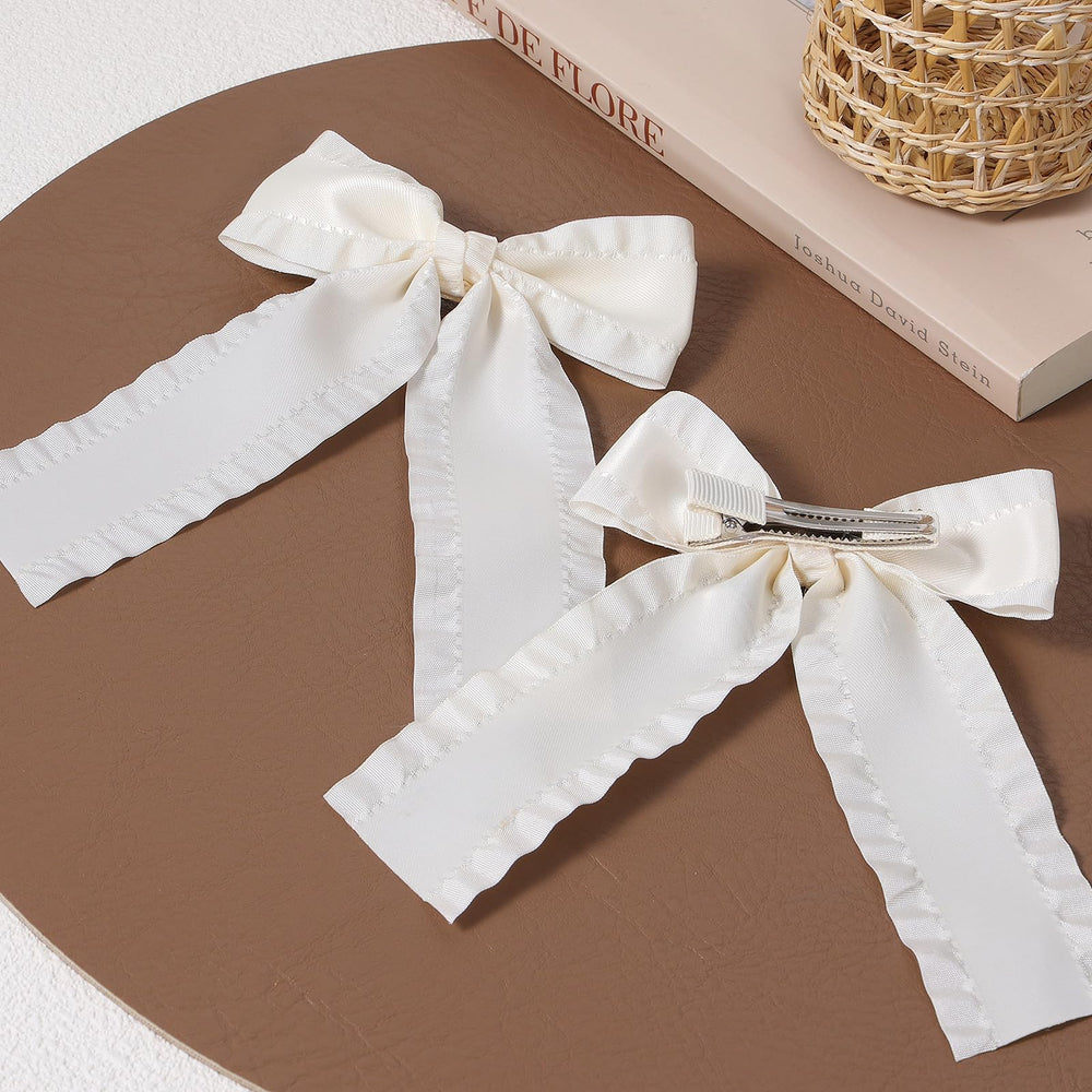 Miroksh bride and flower girl wearing bows offering cohesive wedding styling