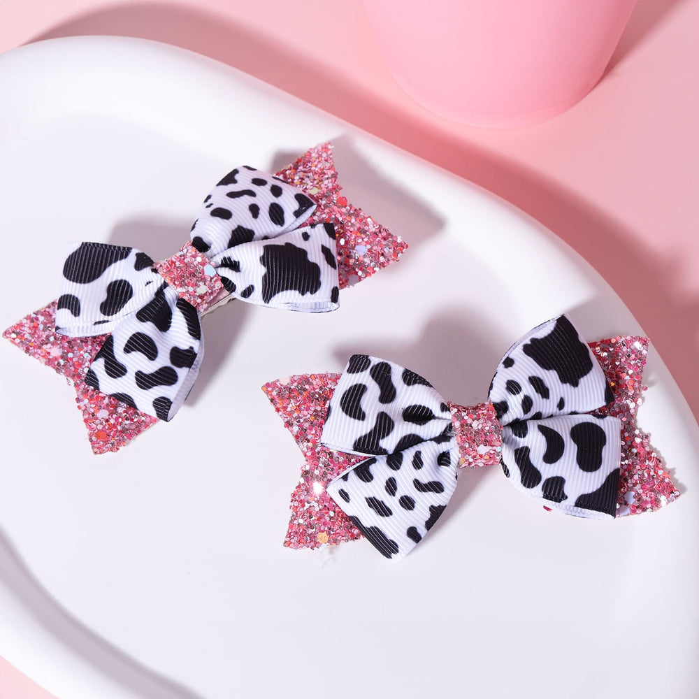 Miroksh close-up of cow-print grosgrain ribbon highlighting durable texture and clear pattern