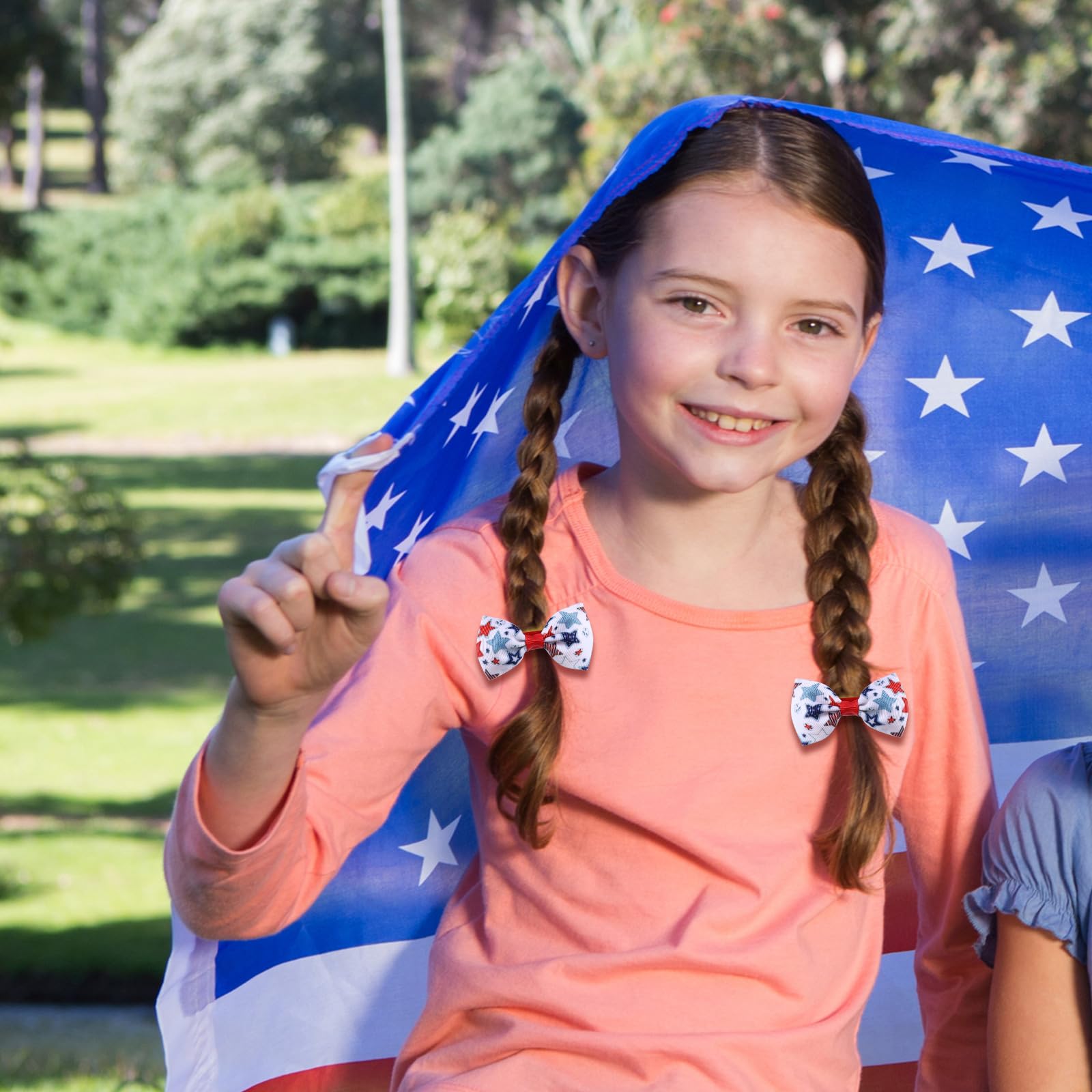 Miroksh family wearing bows at Fourth of July parade, coordinated outfits