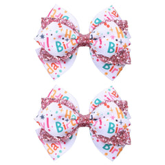 Miroksh front view of two pink birthday bow clips showing festive design and shine