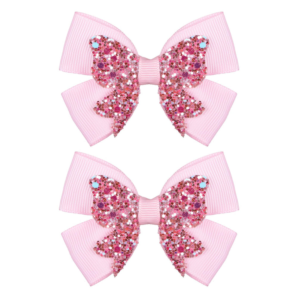 Miroksh front view of two glitter pink bow clips adds sparkle